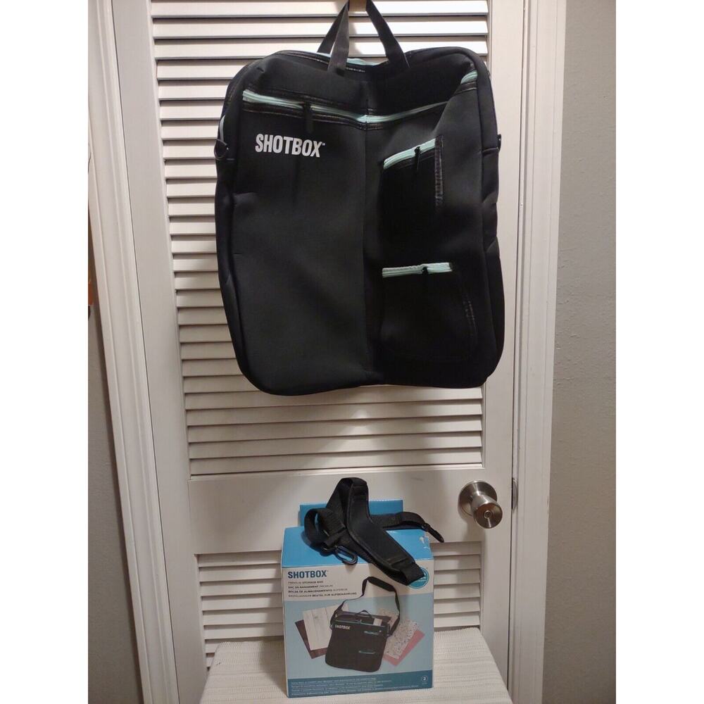 New open box We R Memory Keepers ShotBox Premium Storage Bag 6 pockets strap